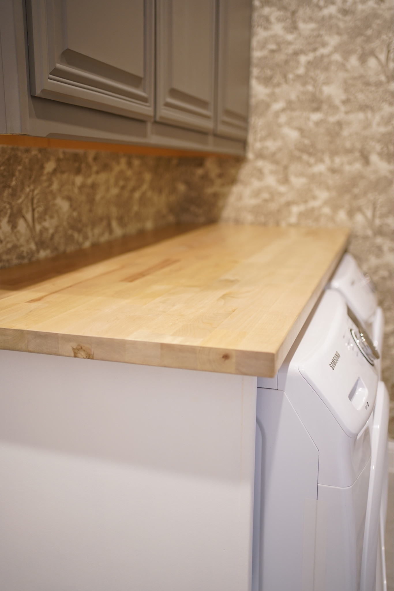 Butcher blocked we purchased & cut to size. Comes in plenty of sizes. We used the stain linked below. Also linking wallpaper and the adhesive we used! 

#LTKHome