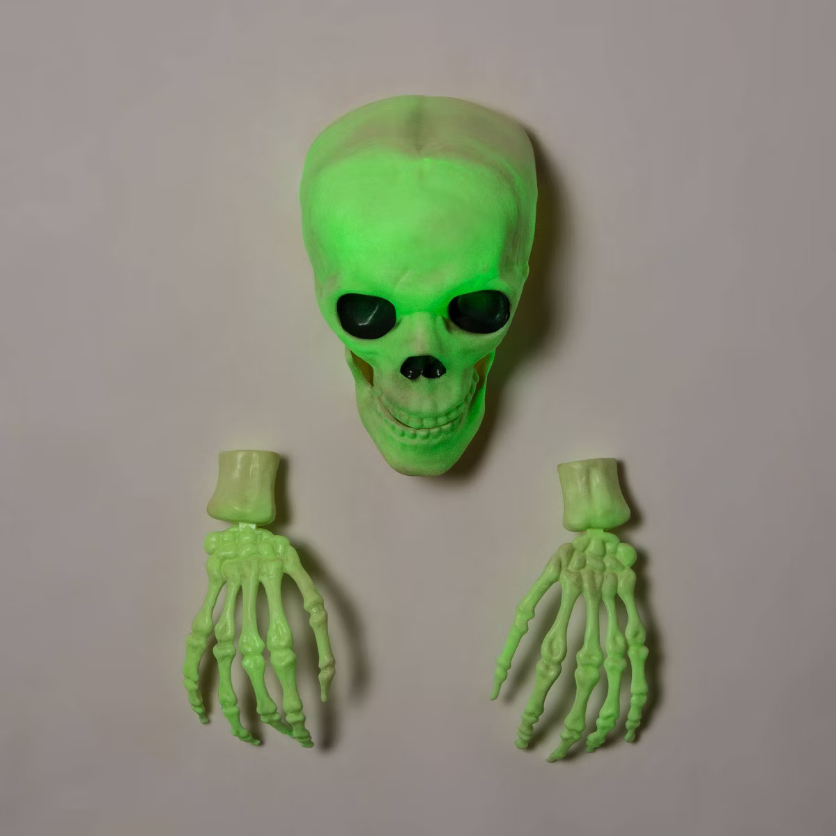 15" Glow in the Dark Skull with Hands Halloween Decorative Prop - Hyde and EEK! Boutique™: Anti... | Target
