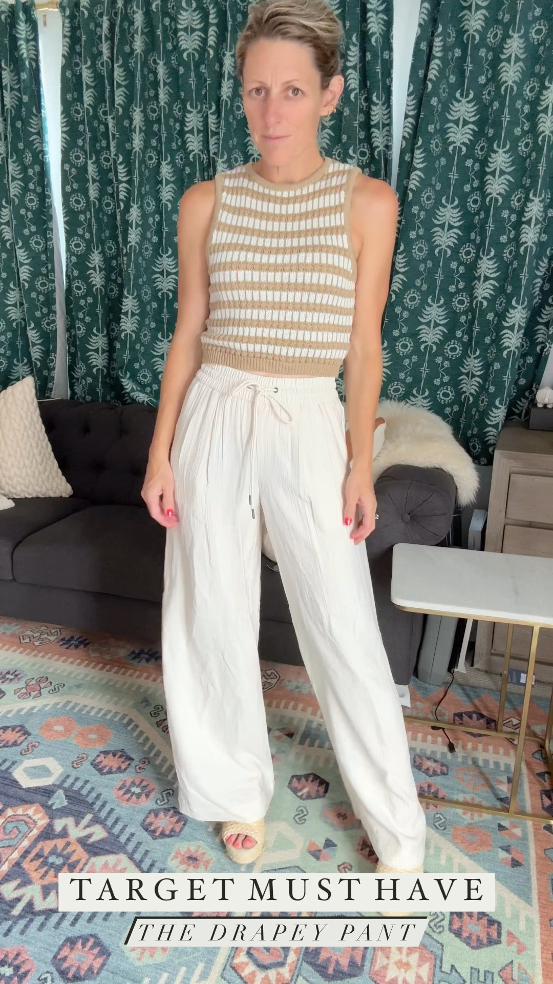 Totally obsessed with the gauze drapey wide leg drawstring pants.  Wearing an xs.  Available in 3 colors. 

#SummerOutfits #SummerPants #WhitePants #TransitionOutfit #TargetfinDS #TargetStyle 

#LTKVideo #LTKFindsUnder50 #LTKSeasonal