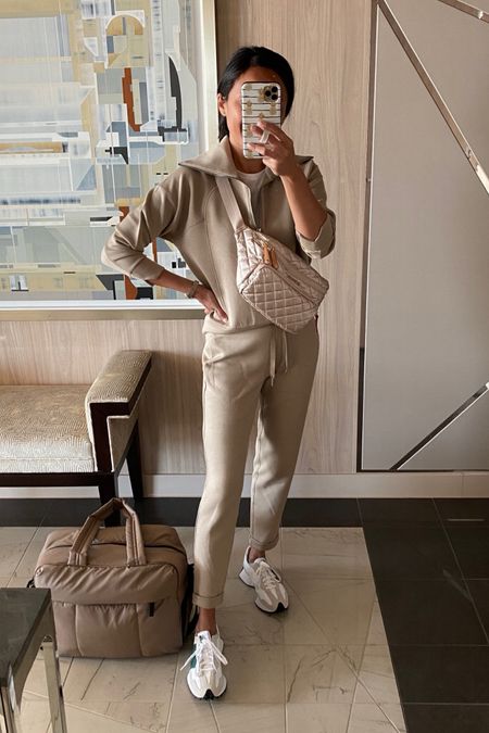 Travel outfit. Pullover top and slim leg joggers run true to size. Code NAOMIXSPANX to save. Sling bag. Belt bag. Travel bag. Duffel bag. Sneakers  

#LTKitbag #LTKstyletip #LTKtravel
