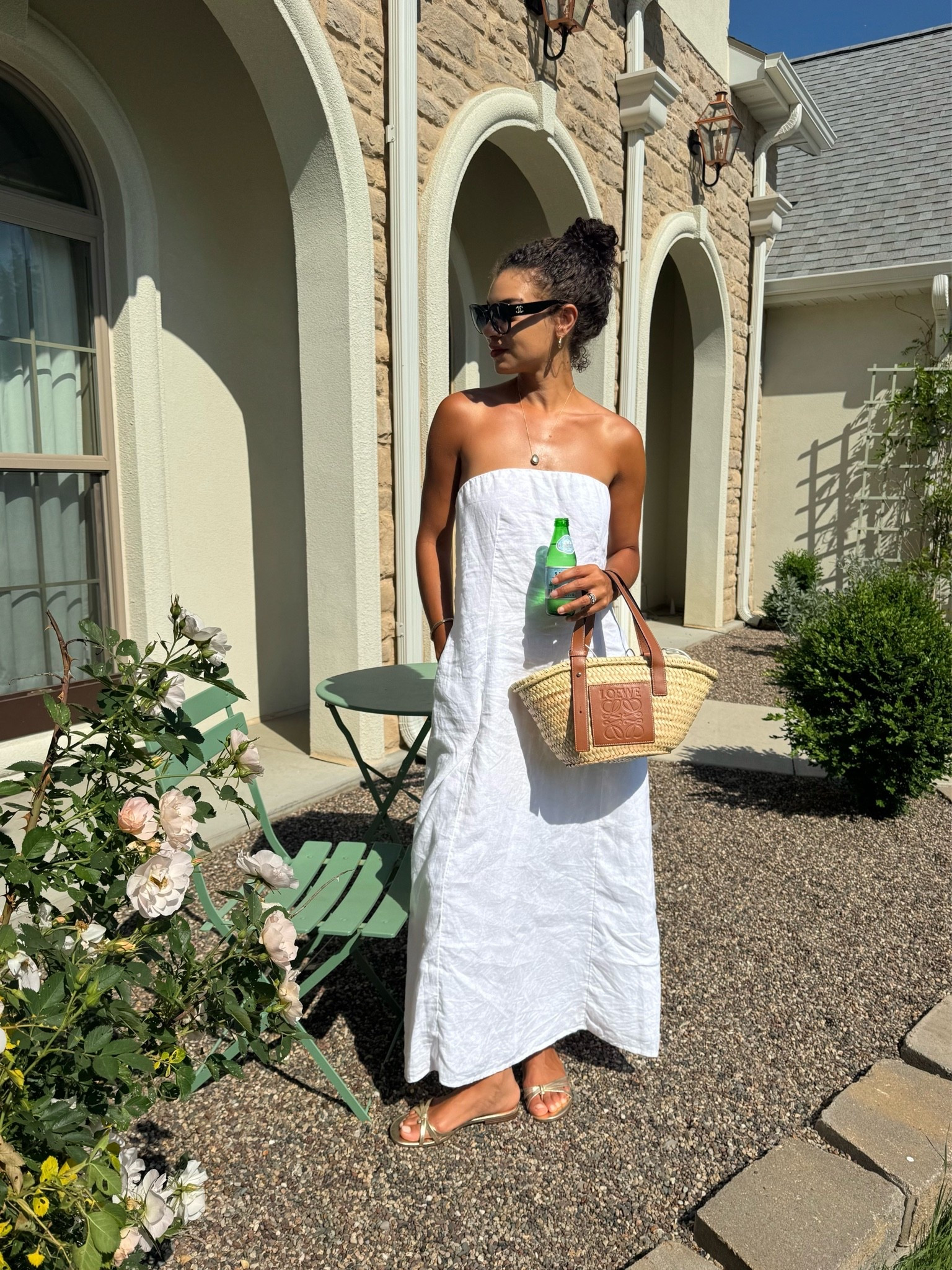 White strapless linen dress with a straw bag, black sunglasses, and gold sandals

#LTKootd
