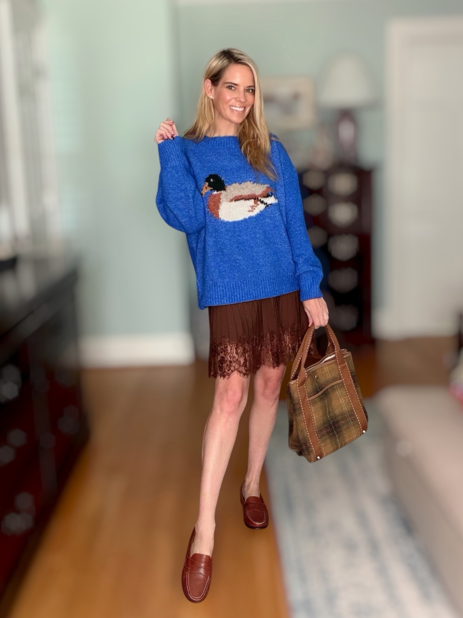 Blue Fox Sweater & Lace Skirt 🍂🦊

I’m loving this unexpected fall-transition pairing! 💙🤎 This adorable blue fox sweater gets paired with a chocolate-brown lace-trim skirt, classic leather loafers, and a plaid tote for the perfect preppy, playful look. 🦊🍫👜 Such a fun way to mix cozy textures and classic fall colors while keeping the outfit feminine and polished!

Preppy fall outfit, fall transition outfit, fox sweater, animal graphic sweater, blue sweater outfit, brown lace skirt, lace skirt outfit, plaid tote bag, classic loafers, women over 40 fashion, preppy style, feminine fall fashion, cozy fall outfit, casual chic outfit, classic American style.

#LTKOver40 #LTKSeasonal #LTKootd