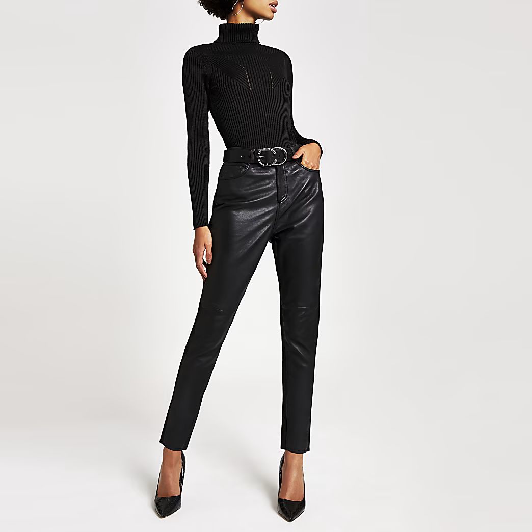 Black ribbed knit roll neck top | River Island (UK & IE)