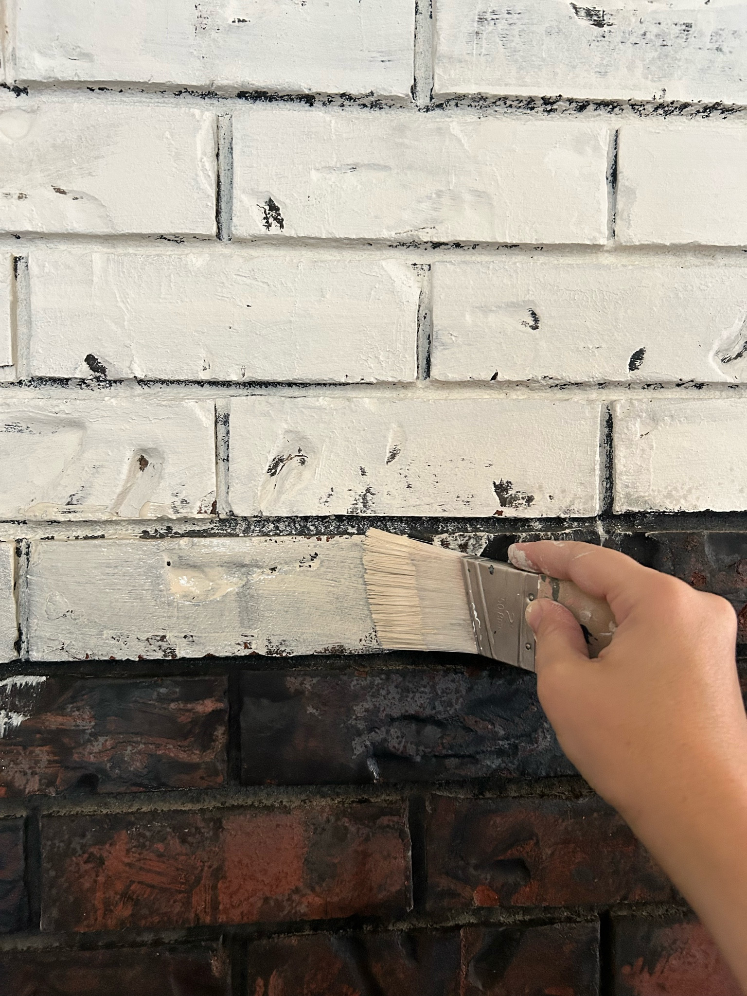Added limewash to transform this brick fireplace! #diy #limewash #homeremodel #homeproject 

#LTKHome #LTKFindsUnder100