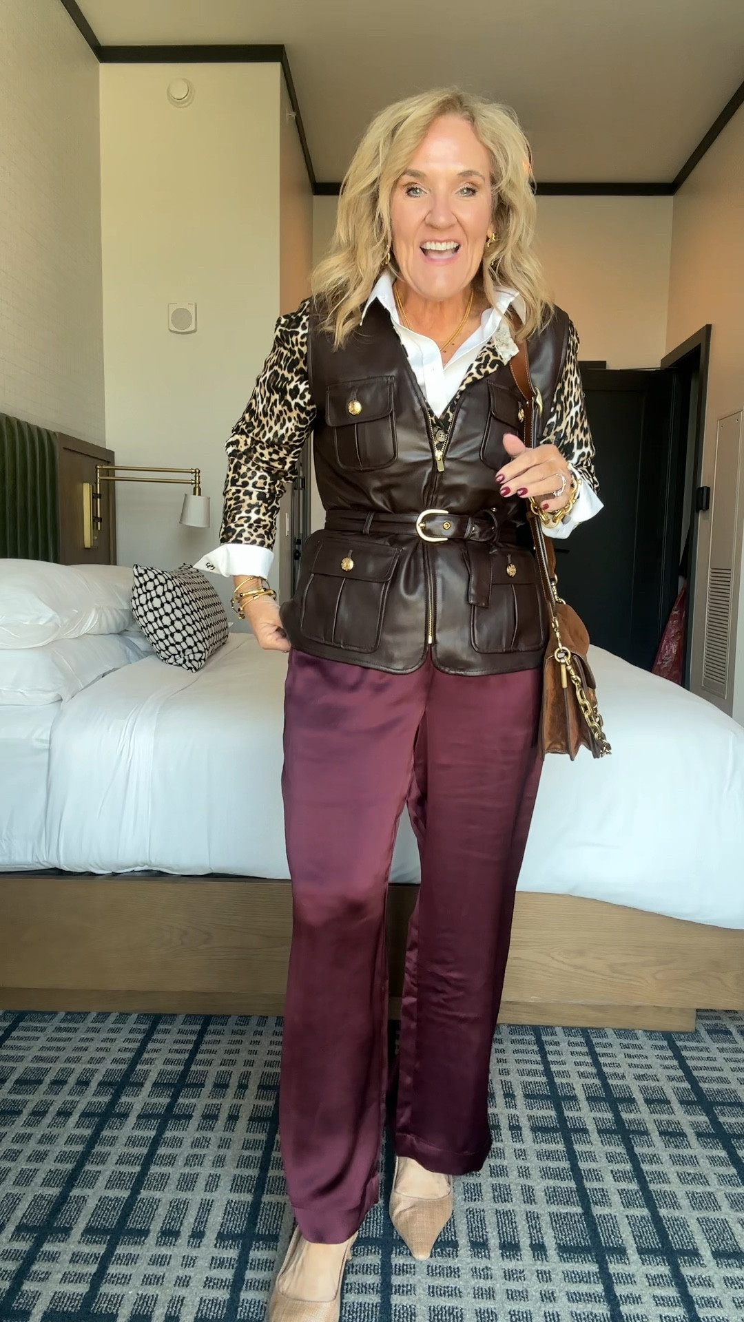 I love layers in the fall, and this is a great way to do it early in the season with no iron blouse, a lightweight, leopard cardigan, and a faux leather vest
Satin trousers are really lightweight too wearing size medium petite 
Fastest size medium/8
Chico’s no iron glass size 1.0 
Cardigan size medium 
Sam Edelman slingbacks I always size up a half for more comfort

Work outfit, office outfit, fall trends

#LTKCon #LTKOver40 #LTKWorkwear