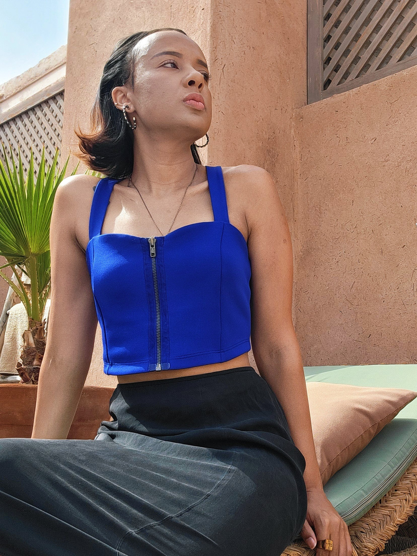 Style inspiration for your Moroccan dream vacation. Royal blue crop top and black midi skirt with evil eye gold necklace. Perfect Morocco vibes!

#LTKootd #LTKPetite #LTKTravel
