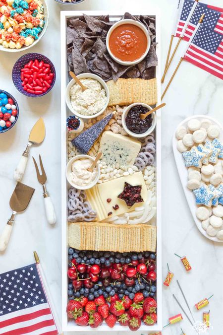 This Red White and Blue Cheese Board makes the perfect patriotic statement for all of the summer holidays and features this that are salty, sweet, creamy and crunchy! grazing board charcuterie board summer entertaining idea Memorial Day Fourth of July Labor Day pool party party food

#LTKhome #LTKstyletip 

#LTKSeasonal