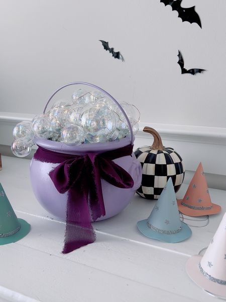 DIY witch cauldron supplies!
- plastic cauldron
- Spray paint 
- Paper (for stuffing)
- Iridescent glass ornaments - mine were from hobby lobby 
- Hot glue gun
- Ribbon 
- Fairy lights 

#LTKHoliday #LTKHalloween #LTKSeasonal