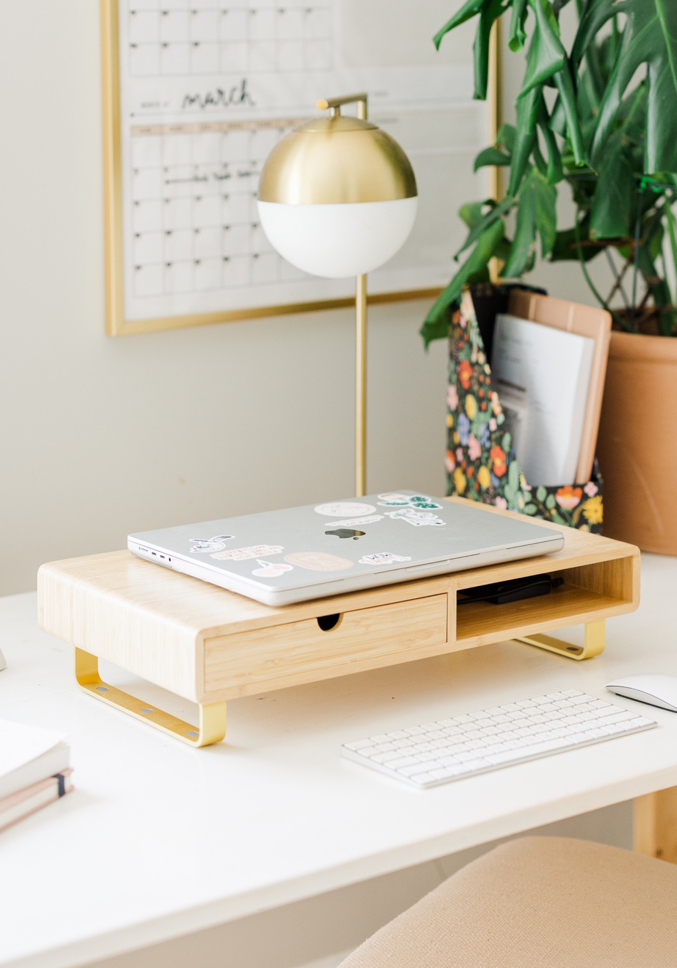 My favorite laptop monitor stand for my desk. It’s a beautiful wood with gold and I am OBSESSED 🫶🏻 