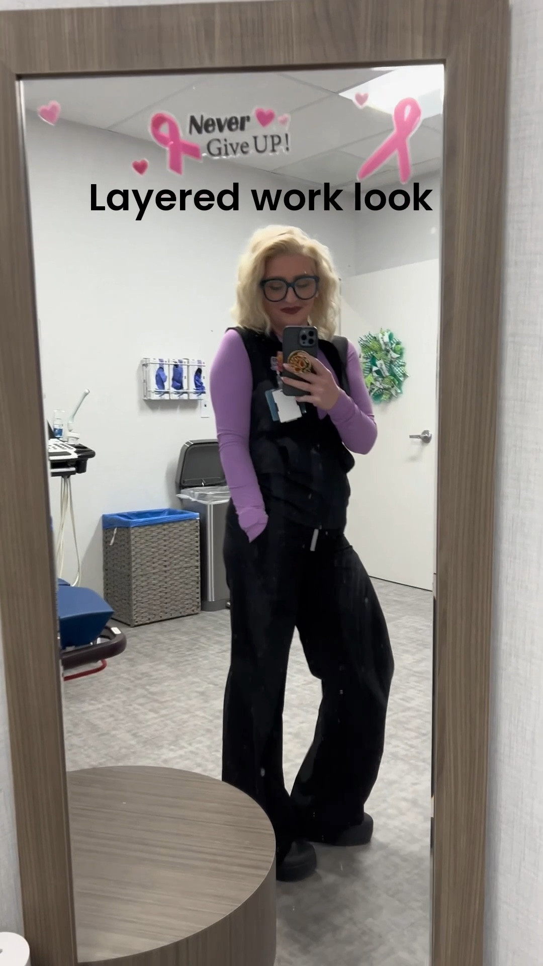Layered a fitted purple top under black scrubs and a black vest.
Comfortable, flattering, and easy for long shifts.
Linked this look and similar pieces in my LTK.