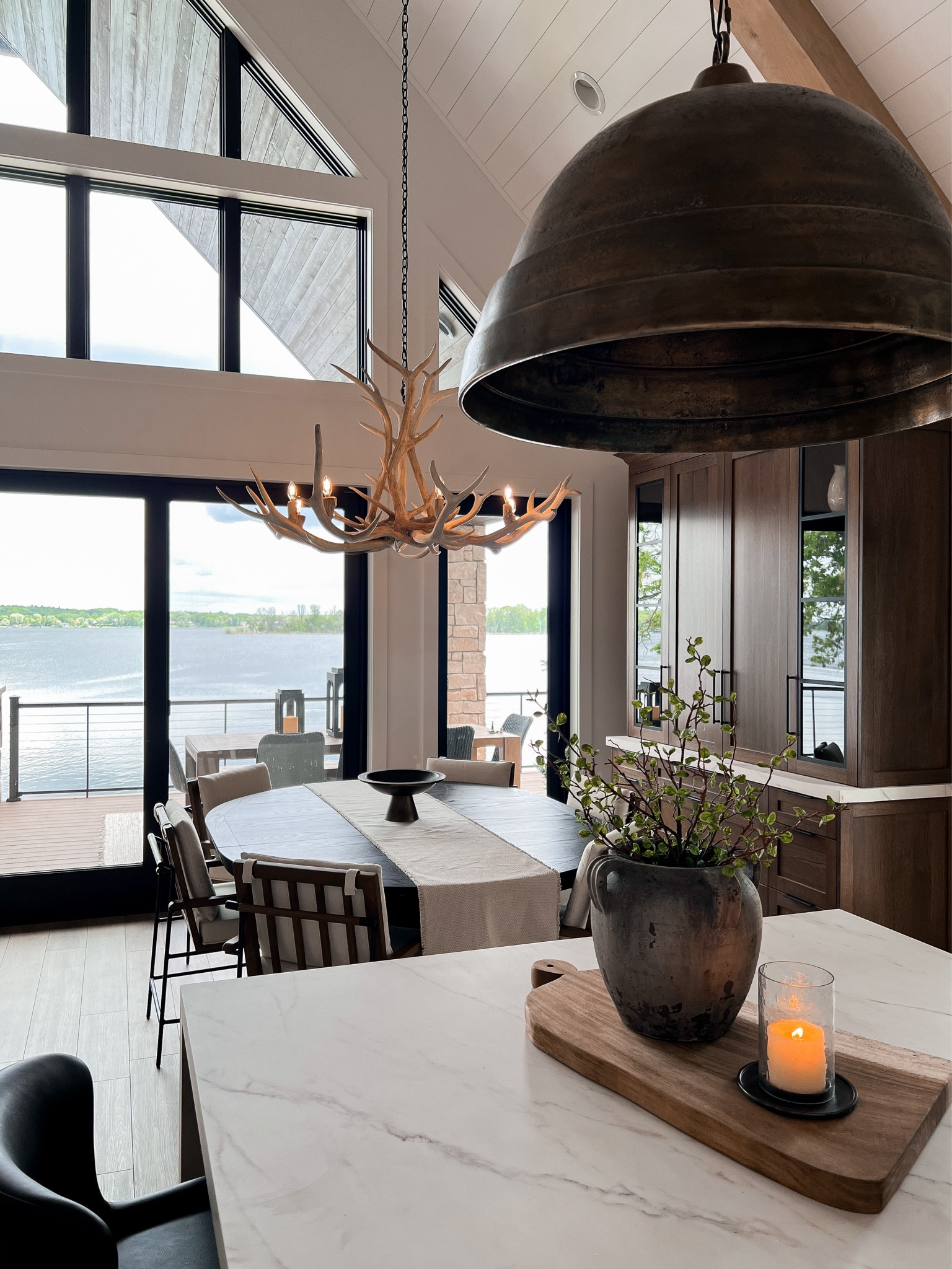 Summer kitchen at the lake! I like to keep our surfaces clean and simple for easy clean up. This counter plant is the prettiest faux green ever!! 

#LTKStyleTip #LTKHome