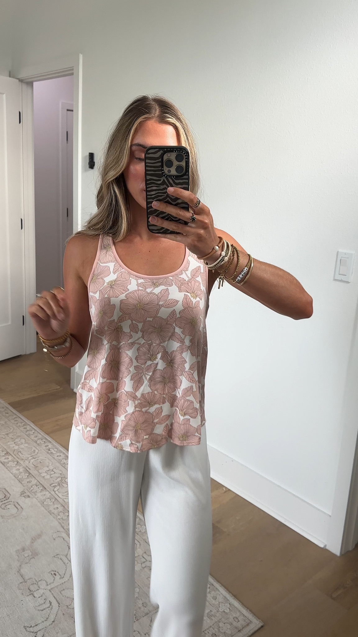 @PJ Salvage size xs Soft, serene, and beautifully bloomed. This modal jersey tank features an allover blush floral print that brings a touch of spring to cozy nights. The scoop neckline and crossover back make lounging feel light, lovely, and endlessly comfortable.

#LTKootd #LTKmorningroutine #LTKSaleAlert