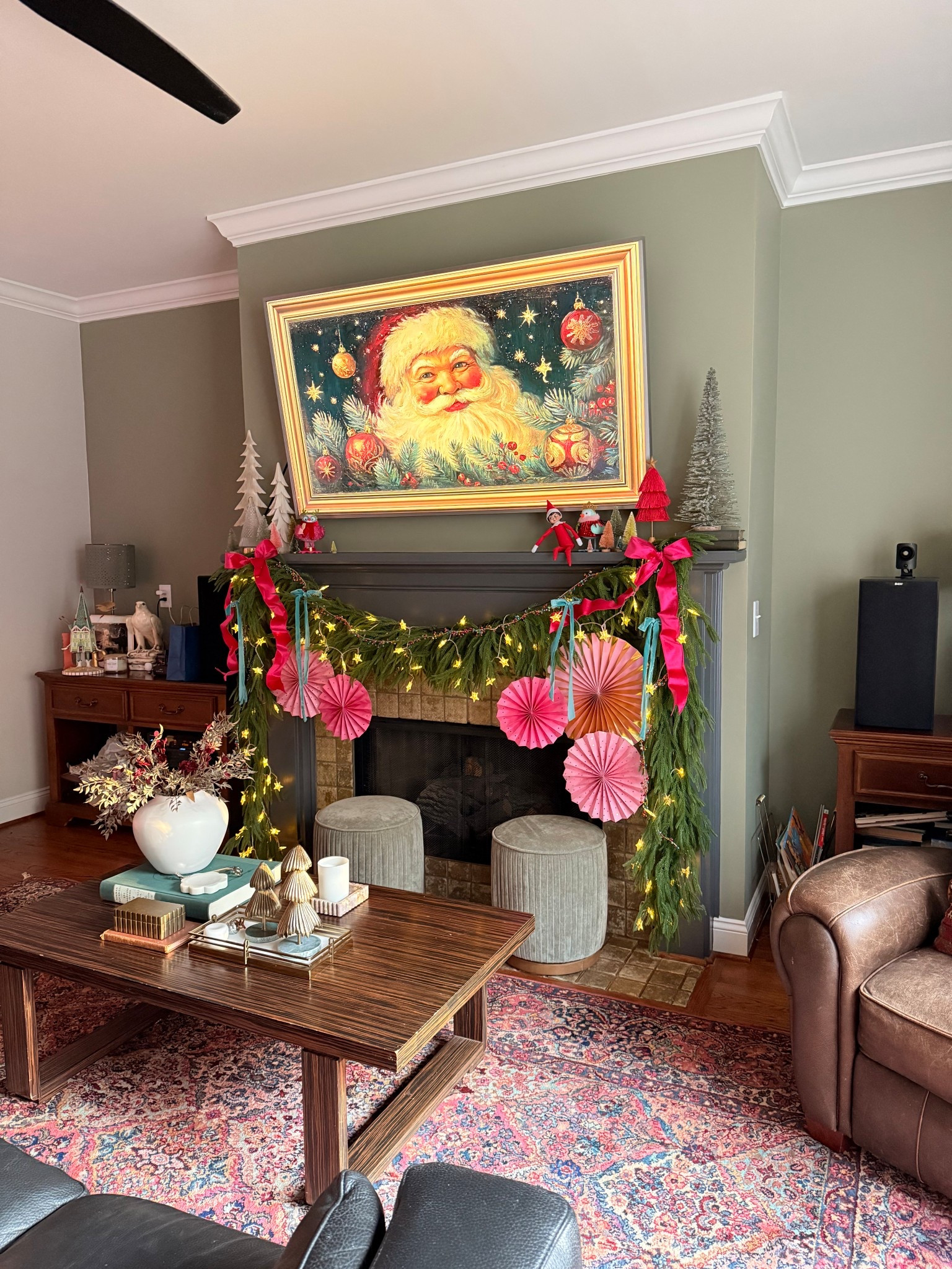 Holiday magic in the living room ✨
This season I leaned fully into color, whimsy, and all the little details that make this space feel joyful. From the vintage-inspired Santa art to the layered garland, pops of ribbon, and playful textures, every piece helps bring that modern-eclectic, family-friendly holiday vibe we love so much.

Linking everything I used so you can recreate the look in your own home—whether you’re going full whimsical Christmas or just adding a few festive touches.

#LTKGiftGuide #LTKSeasonal #LTKHoliday