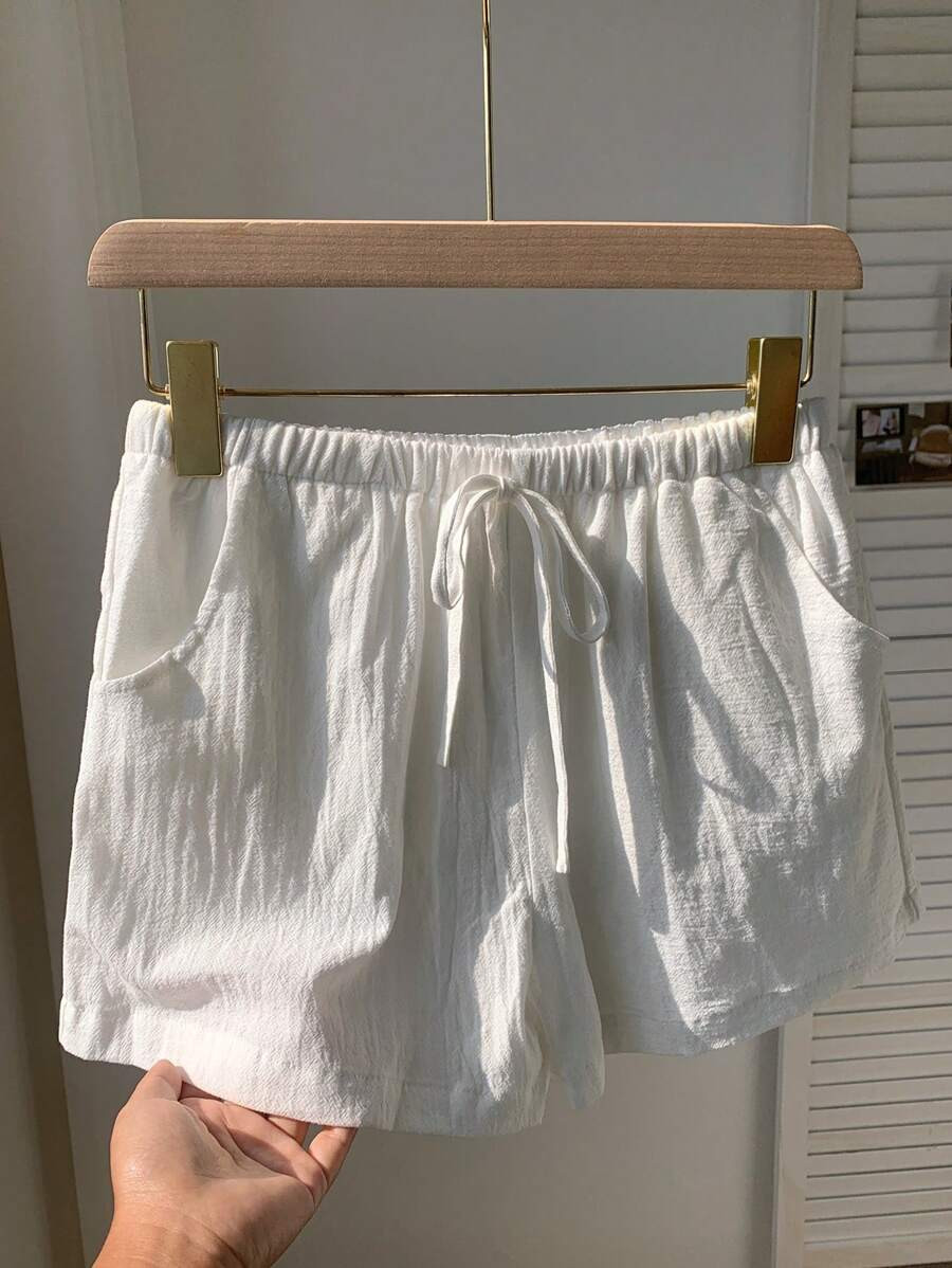 Comfortcana Women Solid Color Waist Tie Pocket Relaxed Casual Shorts | SHEIN