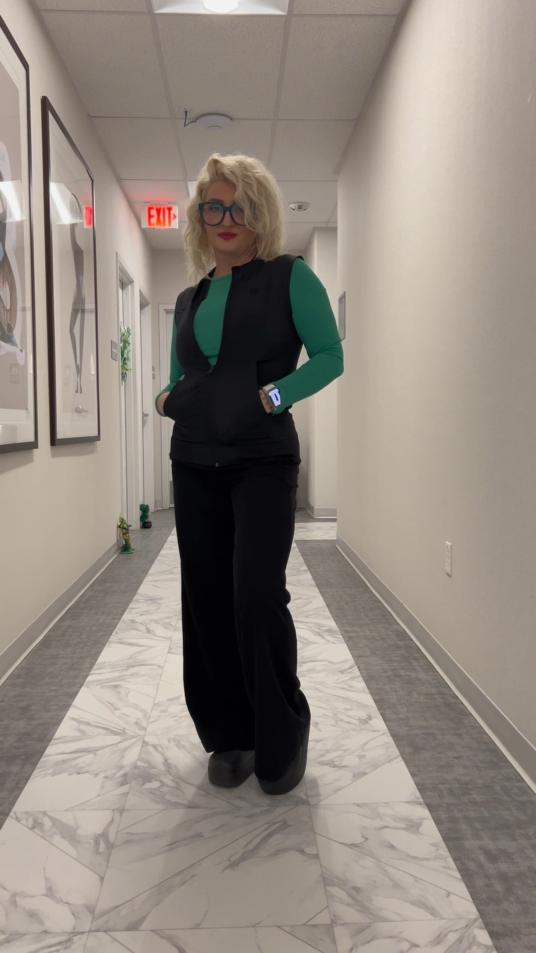 The green top that instantly makes basic black scrubs look more styled. Easy, comfortable, and one of those pieces that gets noticed every time.