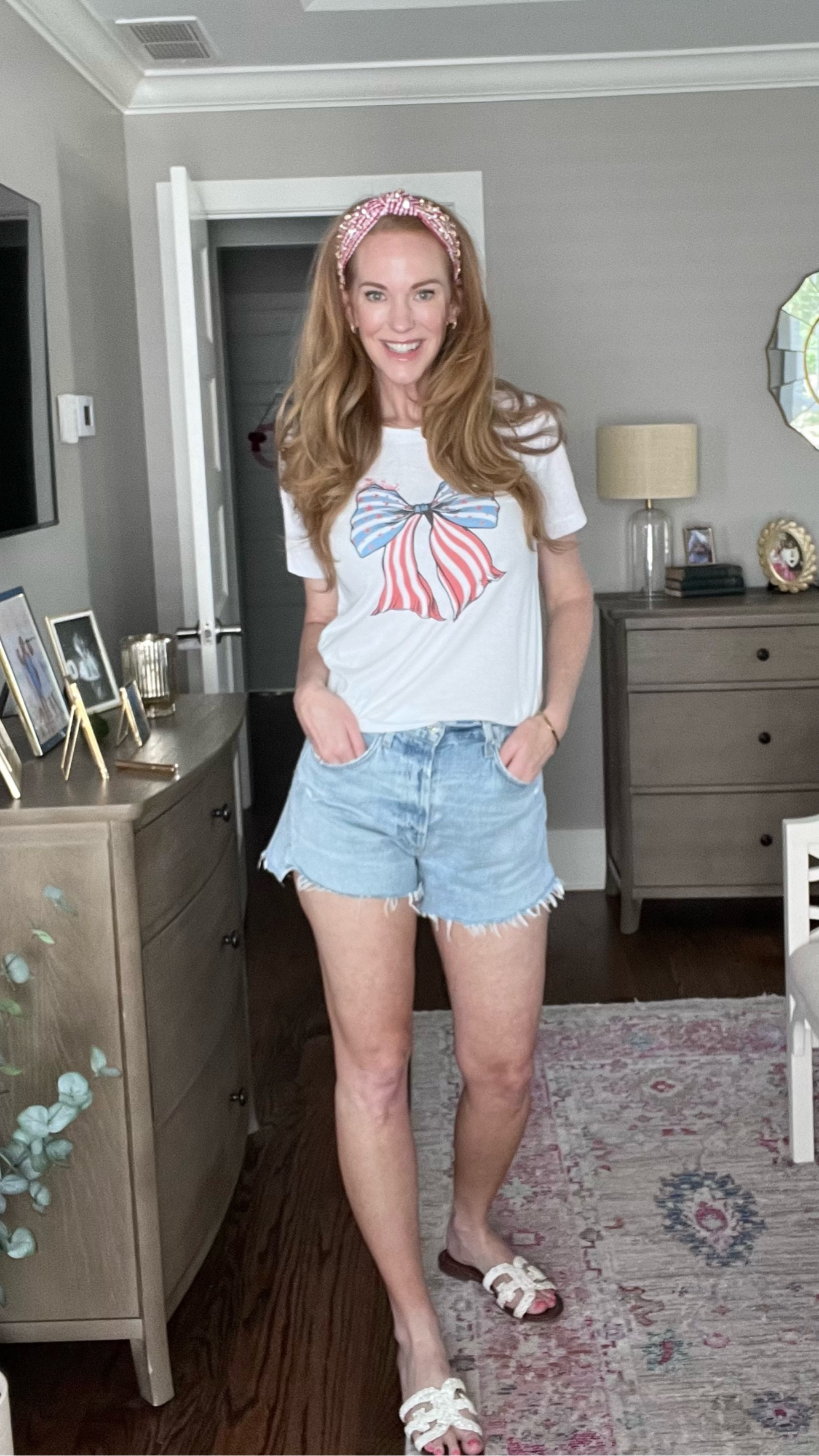 Patriotic and proud! 🇺🇸
Bows are everything and festive bows are even better! These Agolde Jean shorts are my all time favorites, I have them in white too! 

#LTKOver40 #LTKSeasonal #LTKParties