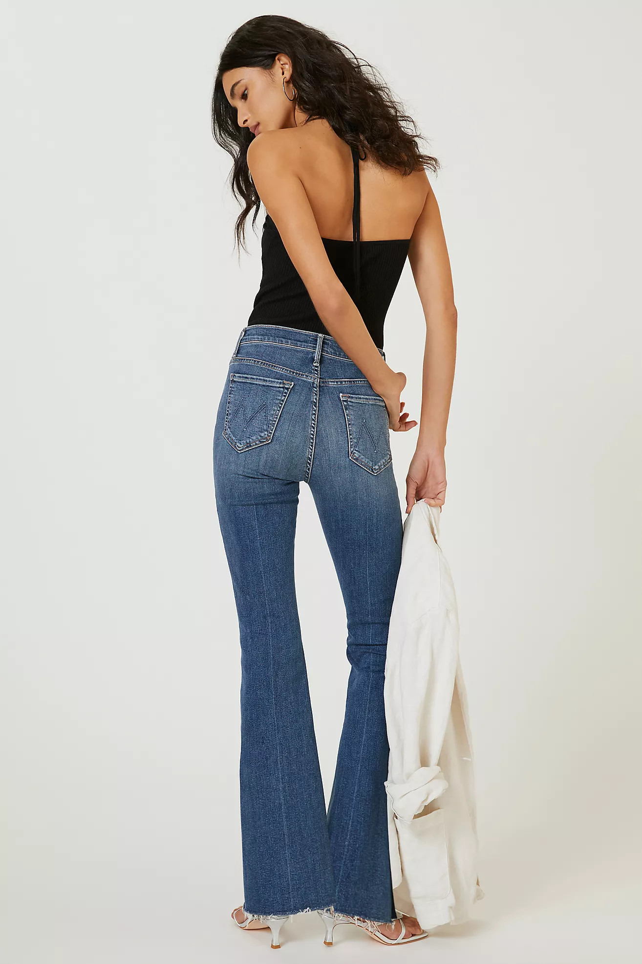 MOTHER The Weekender Mid-Rise Flare Jeans | Anthropologie (US)