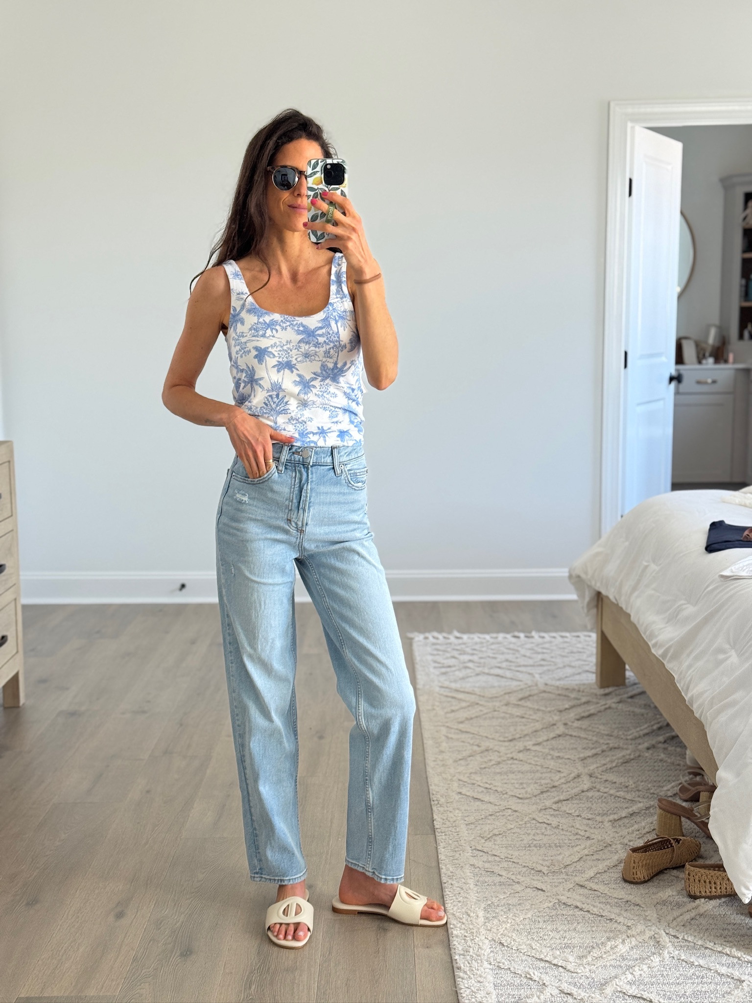Simple, fresh, and so easy to wear. A fitted printed tank paired with light wash straight-leg denim and neutral slides for that effortless, everyday look that still feels put together.

Everything is linked for you to shop.

spring outfit, casual outfit, everyday style, light wash denim, straight leg jeans, fitted tank, summer outfit, effortless outfit, mom style, neutral sandals, simple outfit, casual chic, warm weather outfit

#LTKSeasonal #LTKootd #LTKmomlife