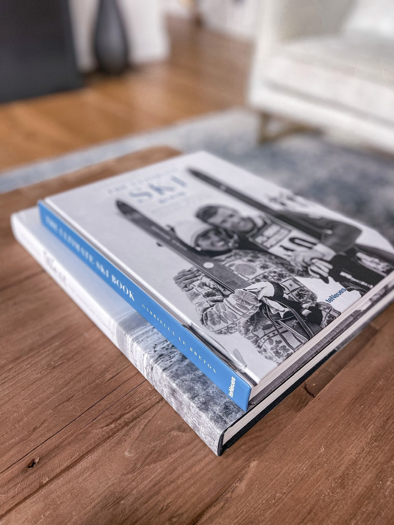 One of those areas that always seems to be tricky is your coffee table. While there needs to be room for the basics like the TV remote, um…a cup of coffee, and maybe a few pairs of bare feet (#boymom), you also want your coffee table to look elegant. Erin has beautiful coasters, a vase, candle, potted plant and books too. And notice how she spaces everything out to make full use of the tabletop’s surface? Her “The Ultimate Ski Book” and “West: The American Cowboy" coffee table books add that personal touch that let you know you’re in the Busbee house. 

~Team Busbee

#LTKhome