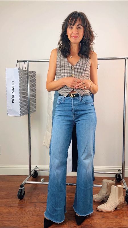 MOTHER makes some of my favorite long wide leg jeans. I have these hemmed to wear with any heel height. 

Shop this style here including a dark wash on sale and in stock today