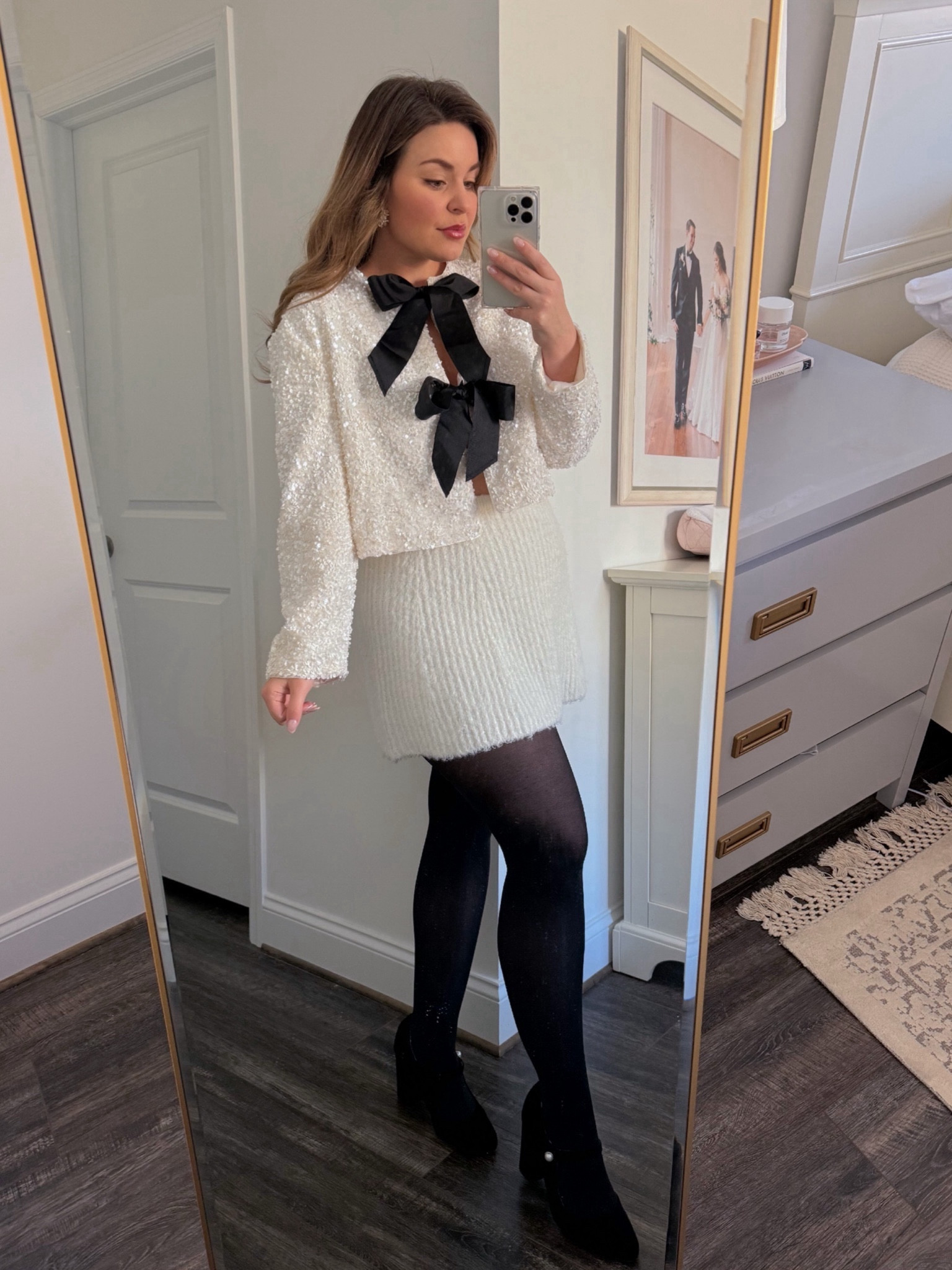 Winter white holiday outfit, bow front top

#LTKmidsize #LTKSeasonal #LTKfindsunder50