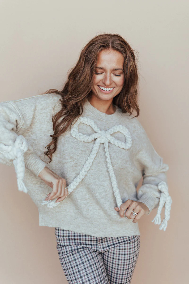 Take A Bow Sweater in Oatmeal | Henly