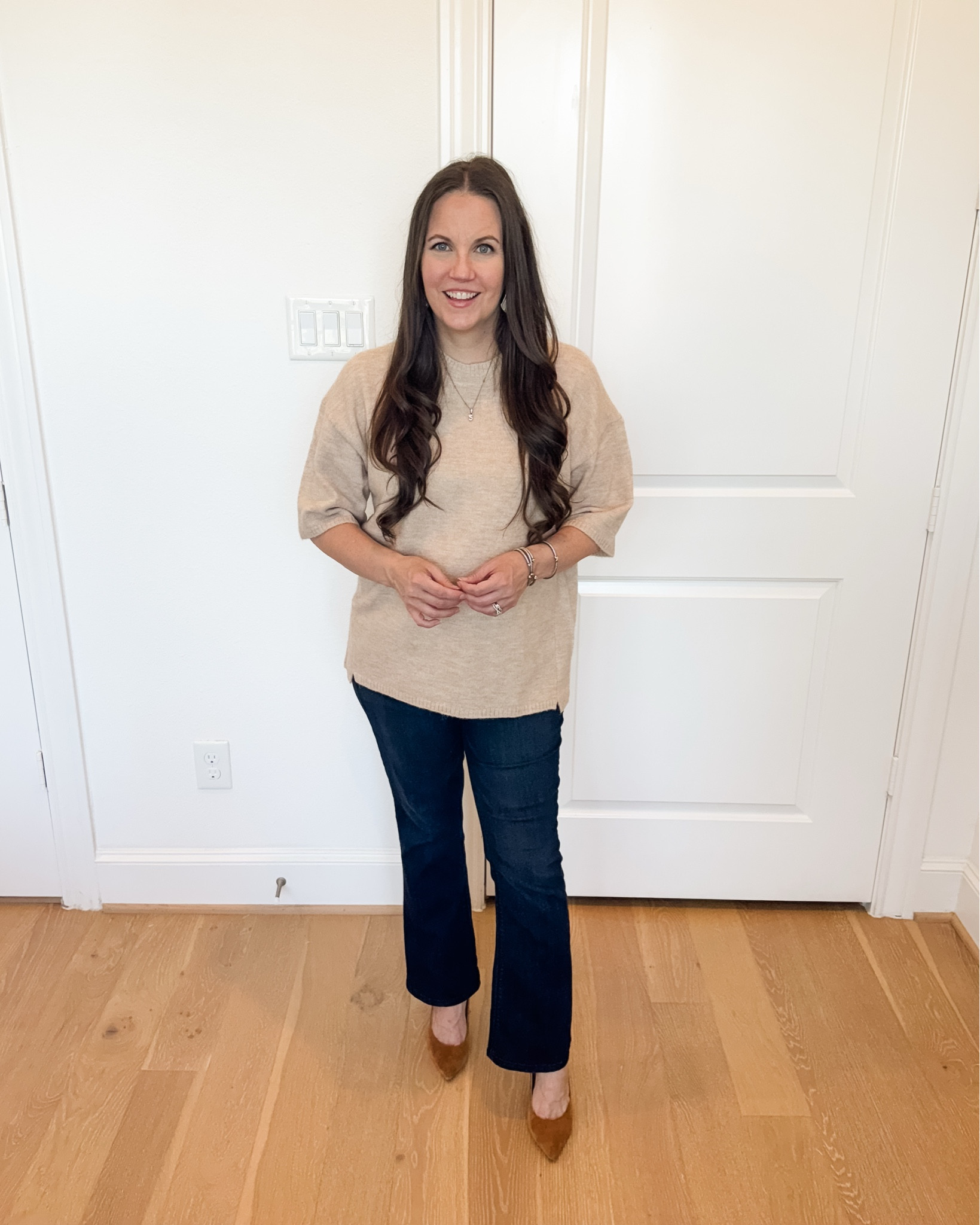 Sharing another favorite fall outfit that works for everything—errands, weekend plans, and even business casual work wear. This look is perfect for warm fall outfits and transitions easily into winter outfits. I’m wearing a light tan brown short sleeve sweater layered over a beige knit top for the prettiest neutral combo. Paired it with dark blue bootcut jeans that give that polished, preppy fall silhouette, plus brown heels to elevate the whole look. Finished with my everyday initial necklace for a simple but chic detail.

If you love casual fall outfits, fall street style, or a classic preppy fall vibe, this pairing is such a go-to. It’s comfortable, stylish, and full of warm neutrals that make the perfect base for fall and winter dressing.

#LTKFindsUnder100 #LTKSeasonal #LTKWorkwear