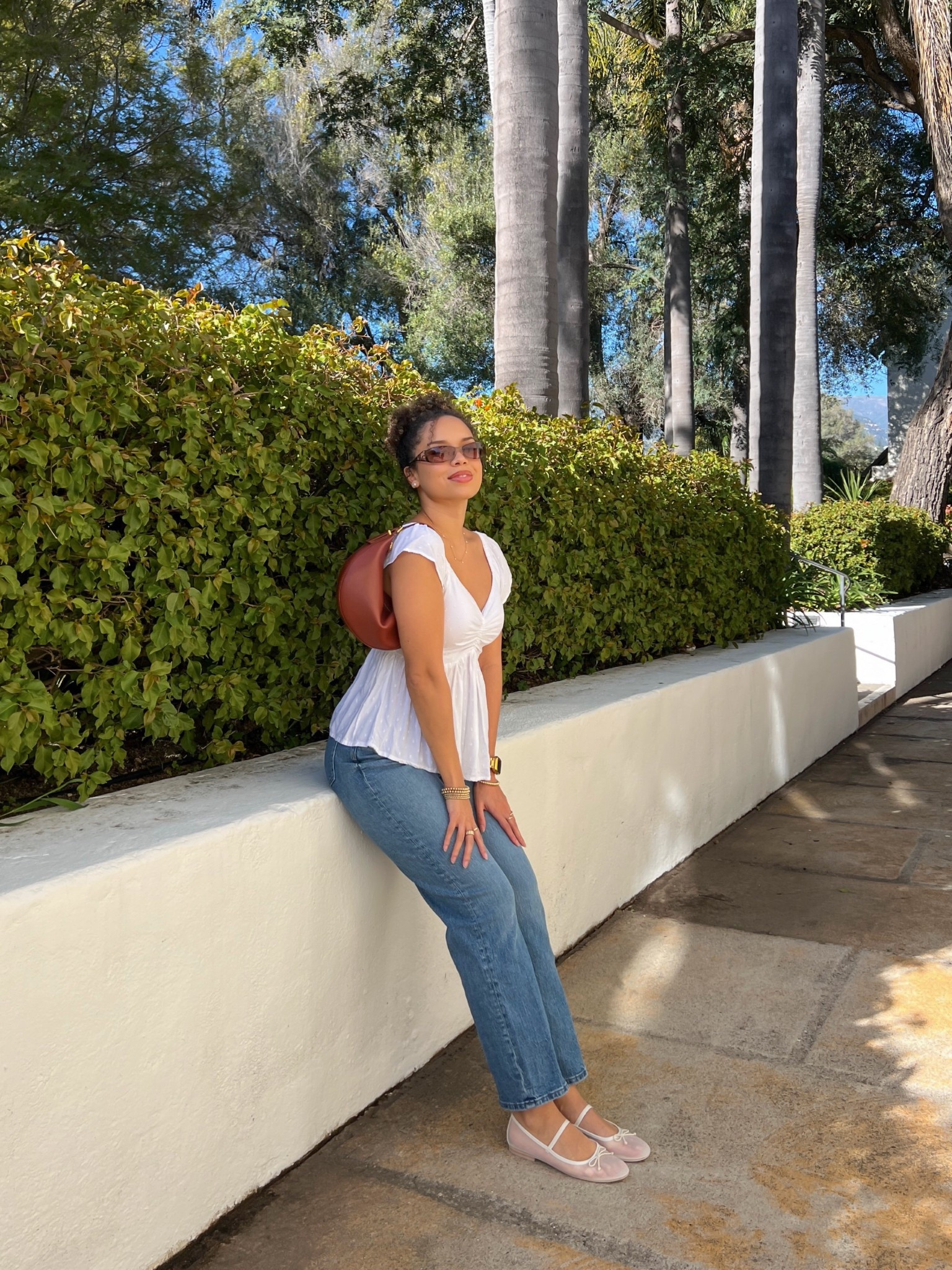 Casual spring outfit wearing a white peplum top and medium wash straight leg jeans with my white mesh ballet flats 🤍

#LTKShoeCrush #LTKSaleAlert #LTKFindsUnder100