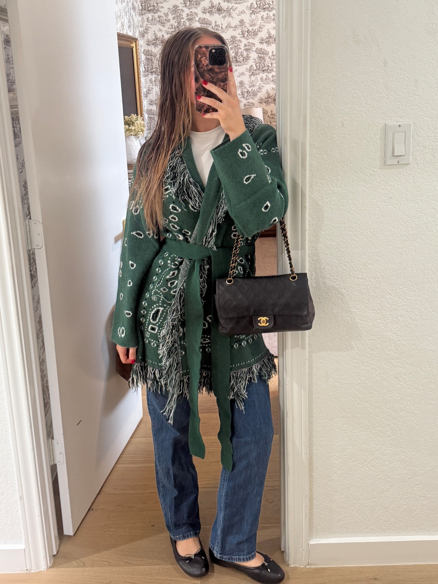 Wearing a size medium in the sweater - runs TTS 