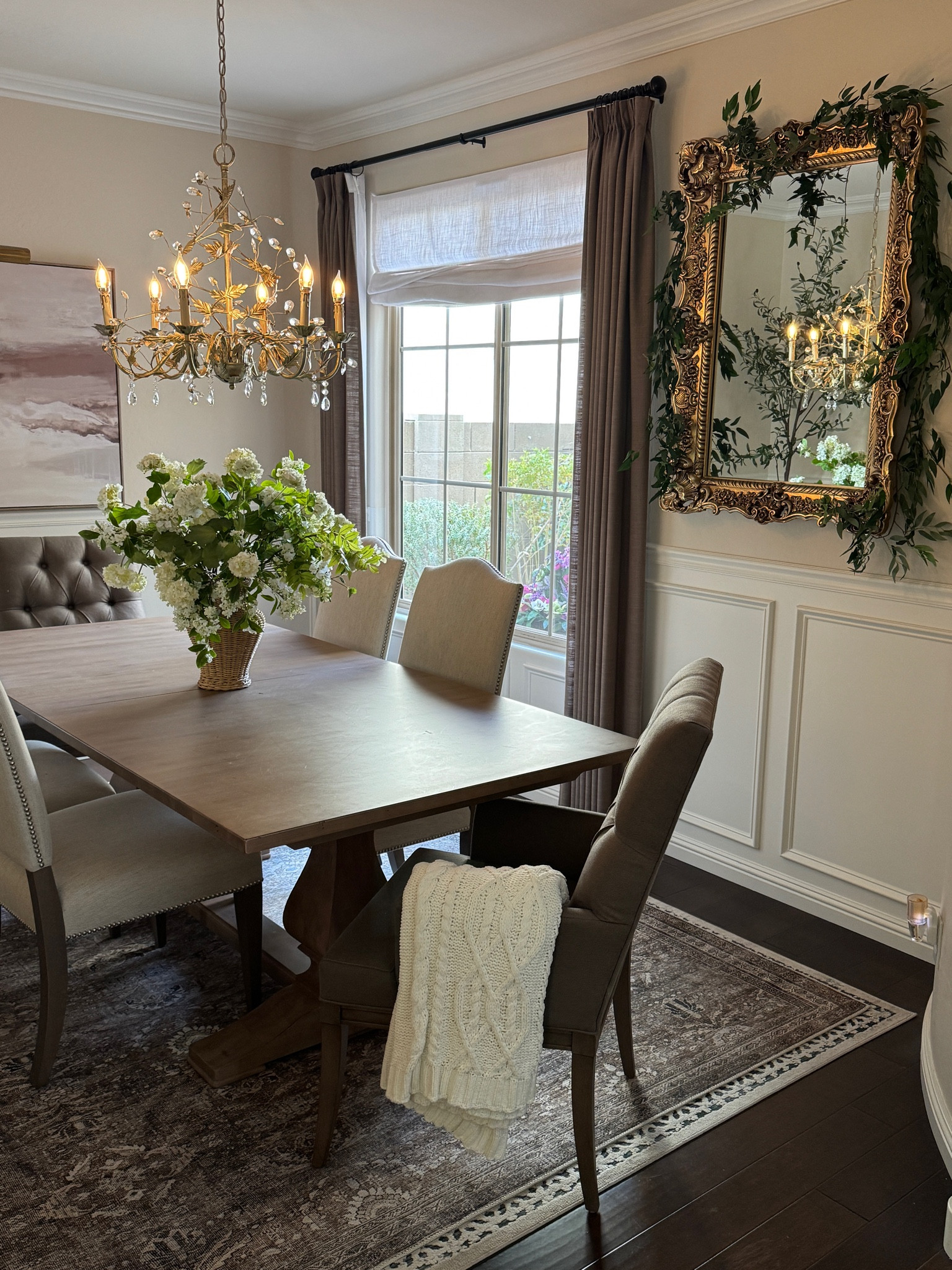 Dining room items 

My table and chairs are from Ethan Allen and don’t have a link. Large mirror was a Facebook Marketplace find, but I linked my exact mirror that’s in my living room, which is similar. 

Two Pages Custom Curtains & Roman Shades 
Liz Linen Pleated curtains in Oak Dim Gray 
Liz Linen Roman Shades in Beige White
Discount Code: JOYFUL 

Wall color: Bone by Dunn Edwards Paints
Trim: Swiss Coffeee

Custom curtains, custom Roman shades, chandelier, neutral rug, vintage gold mirror, dining table and chairs 

#LTKHome