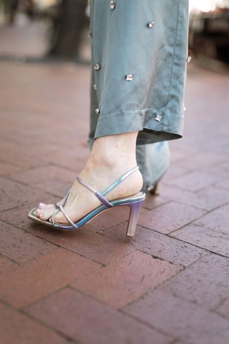 How fun are these metallic (holographic gradient) sandals? I've worn them so many times and they are actually comfortable!

#LTKshoecrush #LTKover40 #LTKstyletip