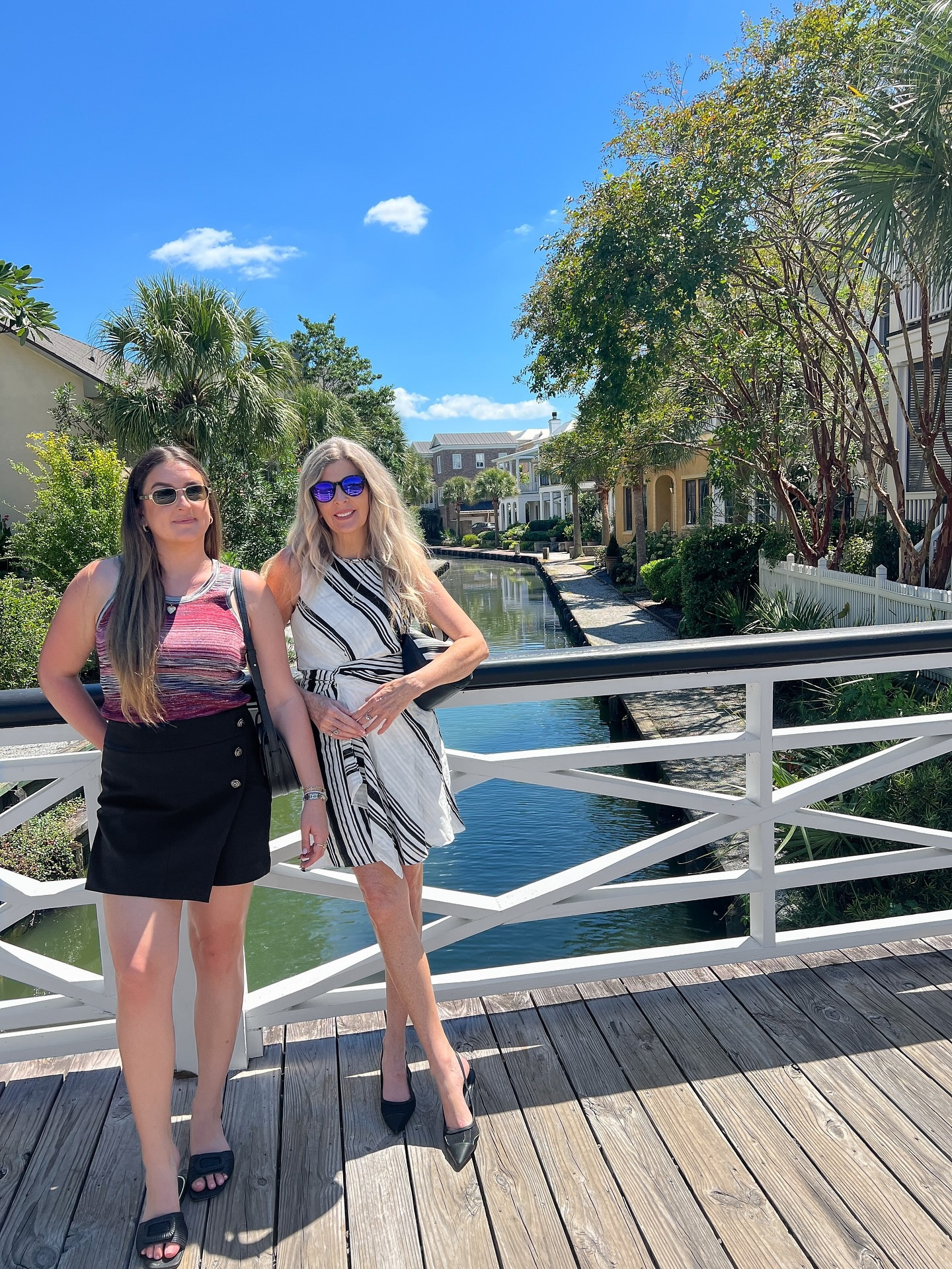 #LTKFallSale Two things we both love — traveling + @whbm outfits 🖤🤍There’s something about their classics that just work no matter where the day takes you. A black and white dress for me, a skort + striped tank for her - easy, timeless, and perfect for exploring Charleston during the day and right into dinner! Oh and these mesh kitten heels - so comfy! 

Shopping details on my ShopMy & LTK link in bio. #ltksalealert #ltkshoecrush

Do you love packing pieces that can go from exploring to dinner out too? ✨

✨ New here? I’m Lynnet - sharing midlife travel, fashion & wellness so you can feel inspired and stylish on every adventure 🌍💫

#WHBMpartner #whbmstyle #CharlestonStyle #MotherDaughtertrip #Traveloutfits #TimelessFashion #VacationOutfits  #TravelWardrobe #midlifestyle

#LTKFallSale #LTKTravel #LTKItBag