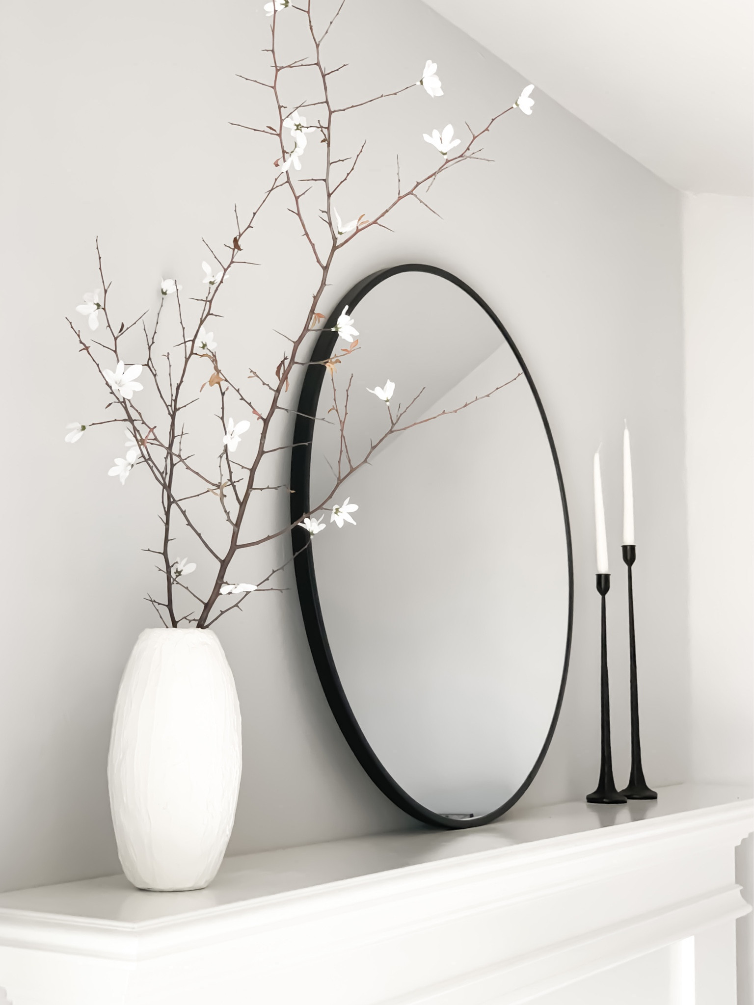 Visit my IG page, if you’d like to see how I DIYed the vase arrangement. Linked similar options below

Living room, home decor, fireplace decor, mantle decor, easter decor, minimal decor, white decor, stems, white stems, vase, mirror, candles, black candle holders, modern decor, 

#LTKstyletip #LTKFind #LTKhome