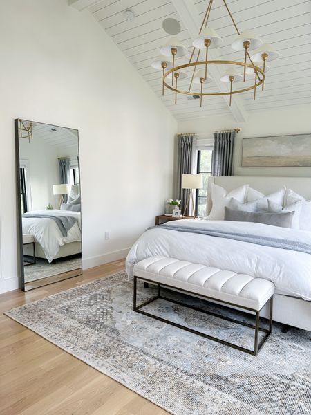 Primary bedroom decor, neutral modern timeless bedroom, bedroom inspo

▫️Paint color: Benjamin Moore Simply White
▫️Rug: 8x10 - it’s very soft and I love the muted vintage vibe!
▫️Bed: King size in Zuma White. We have a standard size boxspring and 12” thick mattress
▫️Curtains/Drapes: 84” length, 50” wide in mineral blue with light filtering lining 
▫️Curtain Rods: Acrylic & Brass with 1.25” diameter rings
▫️Art: I found it locally (preframed) but I’m linking the same art on stretched canvas in a similar size.
▫️Pillows: 4 king size bed pillows, 3 26” Euro pillows (from Amazon), 2 20” blue linen throw pillows, 1 14x36” light gray lumbar pillow
▫️Bedding: Organic cotton duvet cover in white with medium weight down insert (king), Waffle bed blanket in natural (king)
▫️Chunky Throw: This is actually a 15lb weighted blanket in cloud white

#LTKhome #LTKSeasonal #LTKfindsunder50