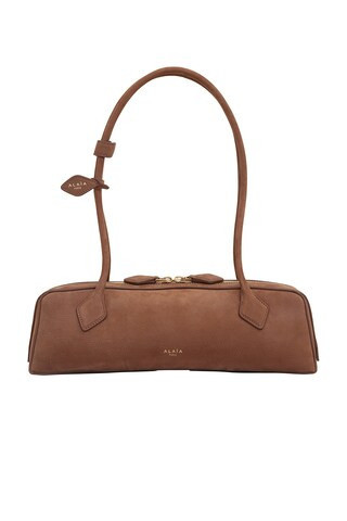 ALAÏA TASCHE MEDIUM TECKEL in Terre D'Ombre - Brown. Size all. | FWRD 