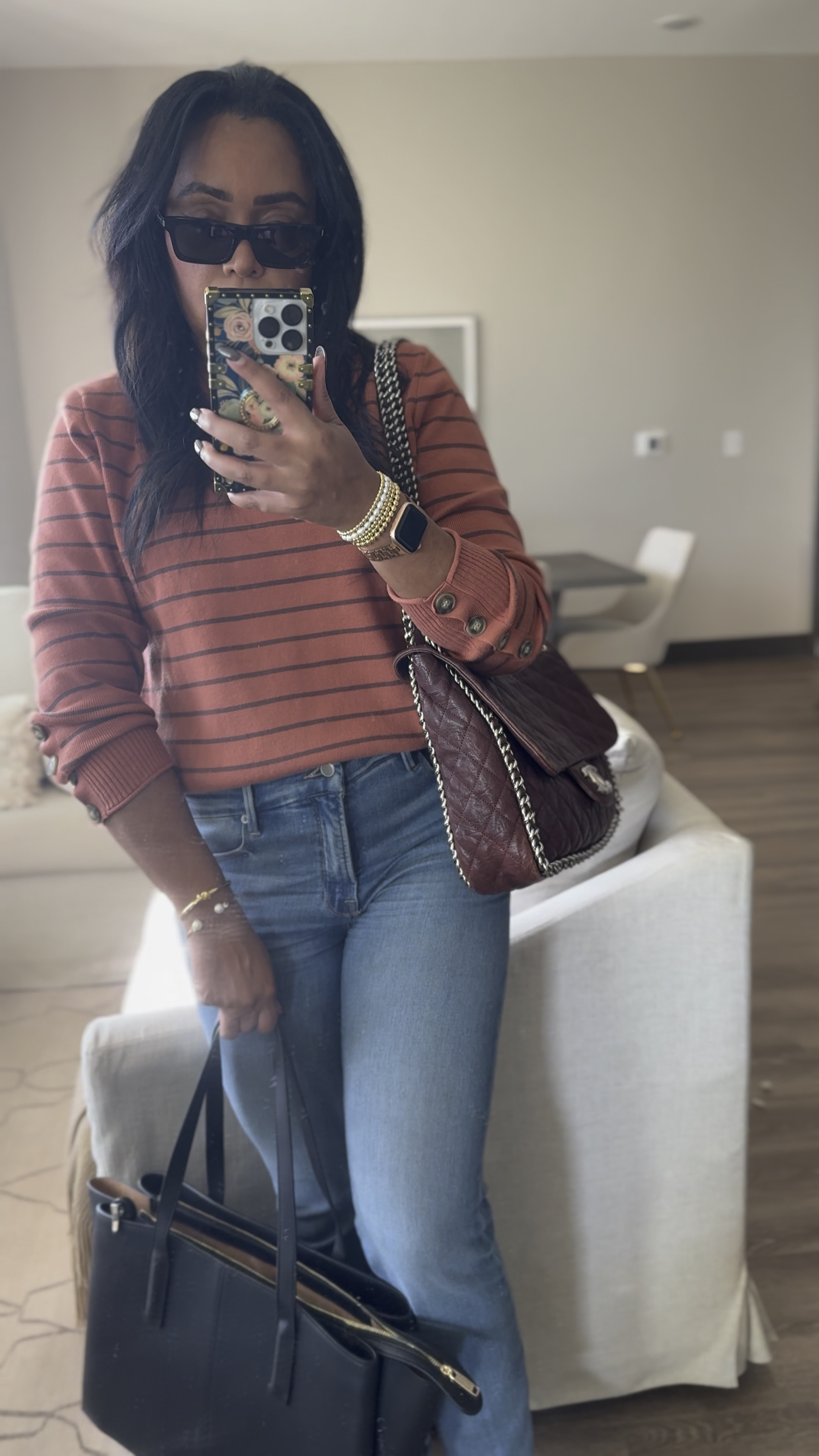 Winter outfit with Good American Jeans, striped sweater, Chanel wrap around chain flap bag, Freja New York Paloma tote. 

#LTKStyleTip #LTKSeasonal #LTKItBag