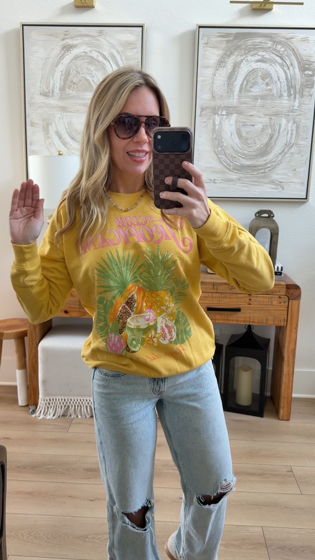 Walmart graphic sweatshirts for Spring and summer! The XS sweatshirt fit me perfectly and I’m usually a small.  Do your true size if you want it oversized. These are my fave AE jeans! I size down to a 2 to get this more snug fit because they run loose and I also prefer a long length in these because I’m 5’7 and this style runs a tag short. I recommend sizing down half a size in these adidas Mary Jane sneakers! I’m an 8-8.5 and do the 8 and have a bit of room in them. Absolutely my vibe with the seas shells and palm trees. LOOOY DISCOUNT CODE: WIFEONADIME #walmartstyle @walmart #walmart #seashell #coastal 