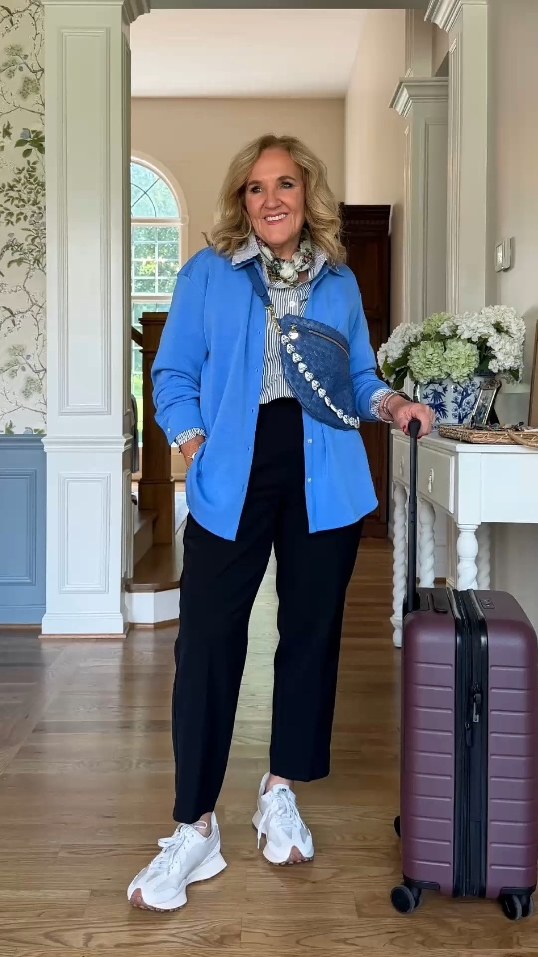 This bright blue jacket, striped blouse, and black pants make a polished travel-day look. Sneakers keep it comfortable, while the crossbody adds a stylish finishing touch.

💡 LTK MADE EASY
❤️ Heart = Support my posts!
🔖 Save = Get sale & restock alerts
📋 Lists = Keep favorites organized
📲 Share = Send lists and products to a friend. Hello, Christmas List!
💬 Comment = Ask me anything about what I'm wearing.:-)

#LTKdayinmylife #LTKgrwm #LTKootd