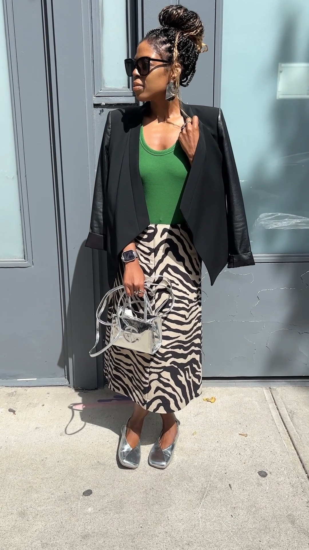 Throwback Thursday to one of my favorite looks from New York Fashion Week last month. I’m still crushing over this zebra print skirt — the movement, the print, everything about it just made the look feel like me.

I paired it with a pop of green, a black blazer, and silver accessories, and I still love how everything came together.

I added the look below if you want to take a closer look.

#LTKootd #LTKU #LTKdayinmylife
