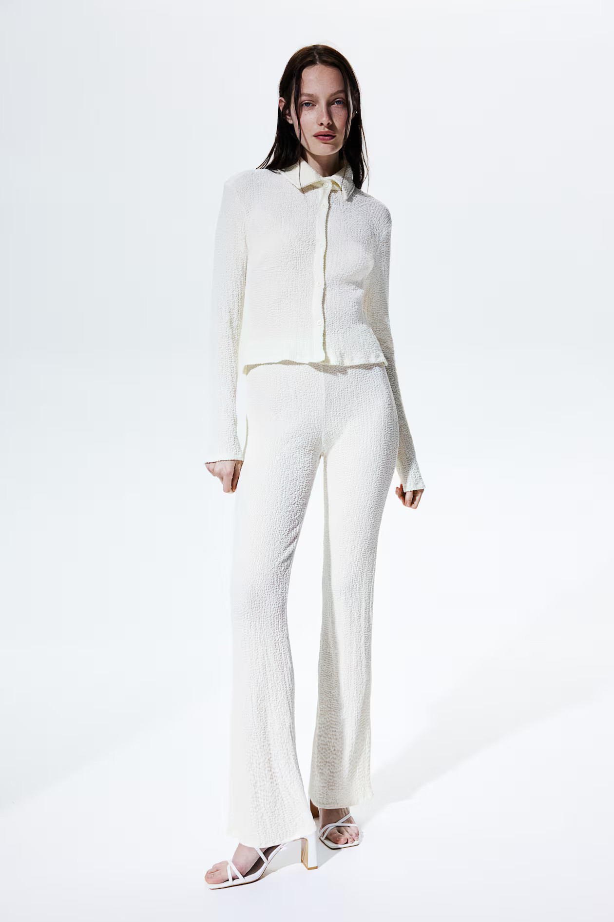 Flared textured trousers - Cream - Ladies | H&M GB | H&M (UK, MY, IN, SG, PH, TW, HK)