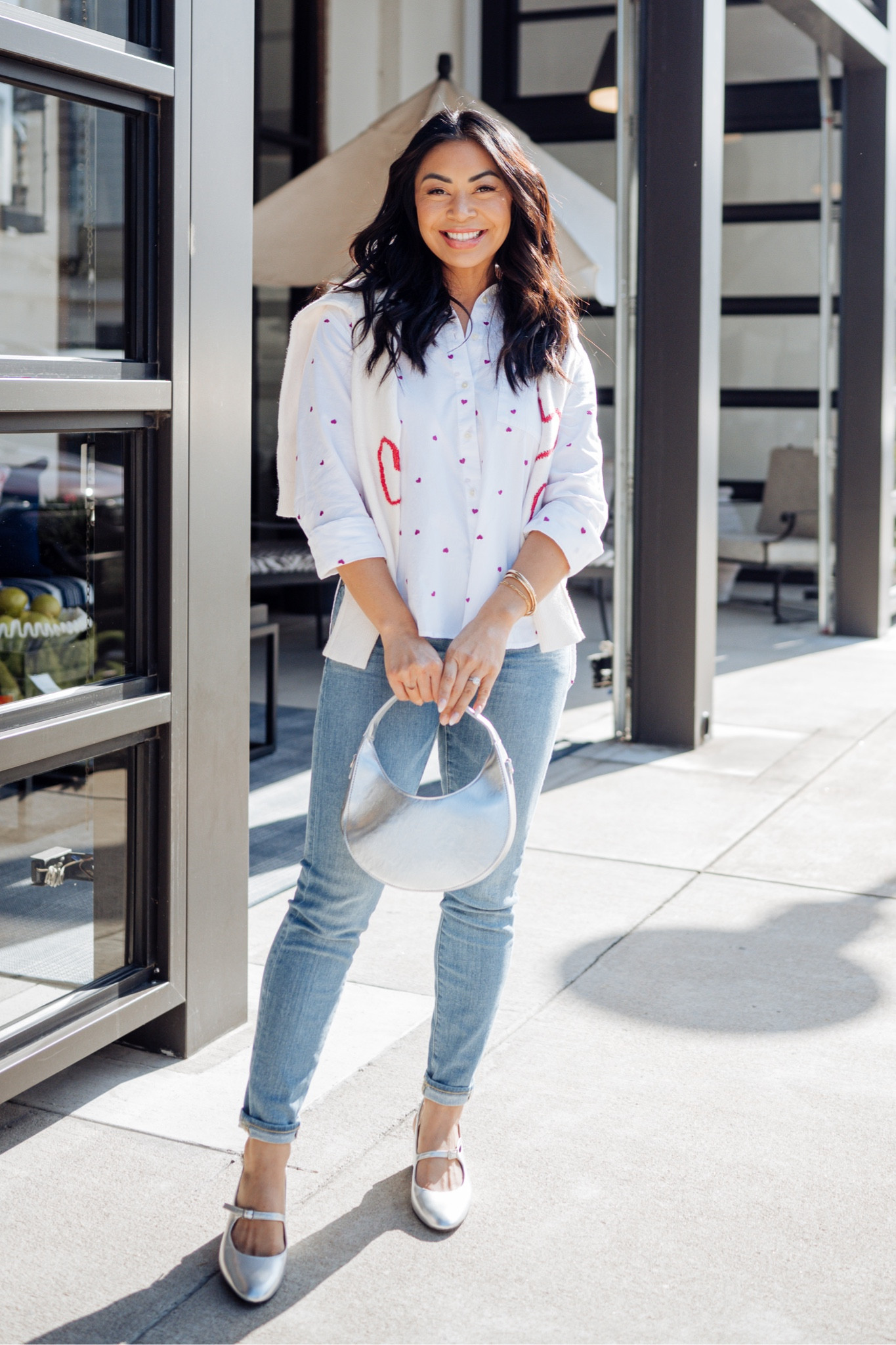 Heart print sweater over a heart print button down shirt. Too many hearts? I think not! Love this pairing with jeans for the perfect day time or night time look! 

#LTKstyletip #LTKover40 #LTKSeasonal