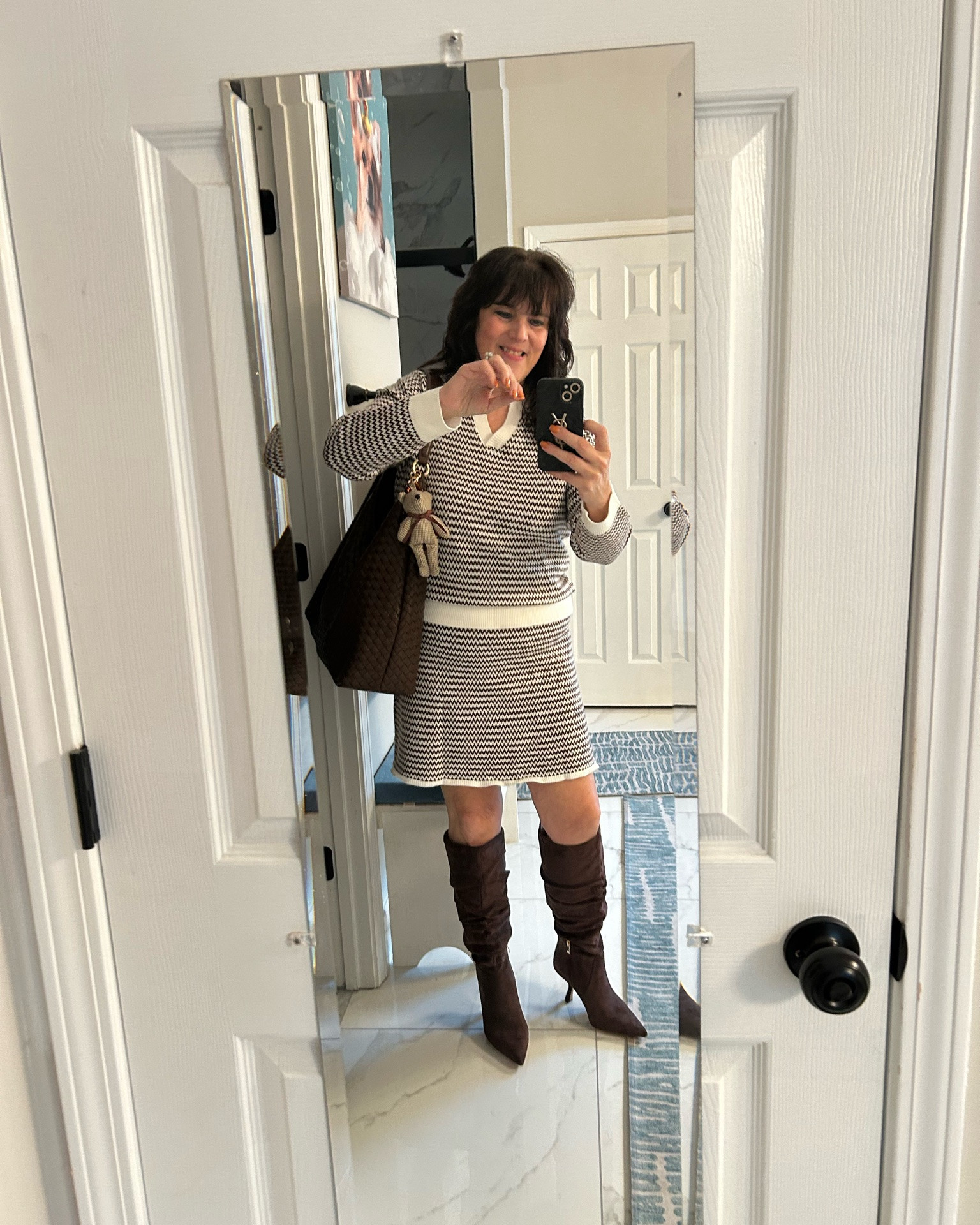 Amazon did it again!! 🛍️ This brown-and-white knit set is everything — matching sweater and skirt with the cream trim, so classy and put-together without trying. And it's all from Amazon, can you believe it?! I styled it with my tall brown boots and a big quilted tote for a cozy, polished fall look. The set is soft, forgiving, and flatters at any age. Affordable that looks way more expensive — my favorite combo 😍I am wearing a large. Always be confident, ladies 💋 Boots or flats with this set — how would you wear it? #amazonfinds #amazonfashion #matchingoutfit #knitset #over50fashion

#LTKootd #LTKvlog #LTKOver40