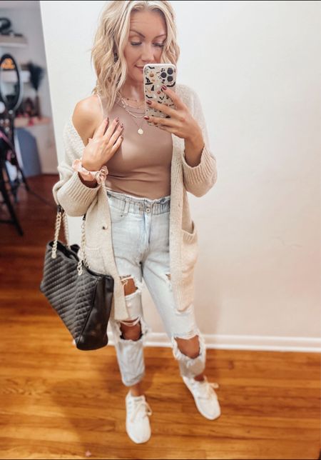 I think I might be In my #neutralstyle era for #fallvibes 

I love functional, affordable, cute fits to work and chase babes in as a mama to 5 
This fit has is literally all my fall staples from the cropped taupe tank, the cream cardigan and paper bag jeans all my mamas need down to this handbag and shoes

For sizing reference I’m 5’6 130 lbs wearing a medium in both tops, and size 5 in jeans 💕

#LTKstyletip #LTKfindsunder100 #LTKworkwear