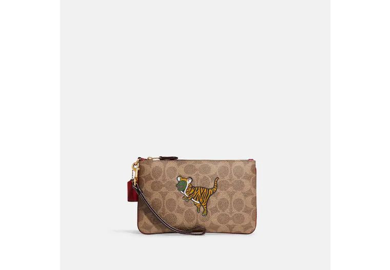 Lunar New Year Small Wristlet In Signature Canvas With Tiger Rexy | Coach (US)
