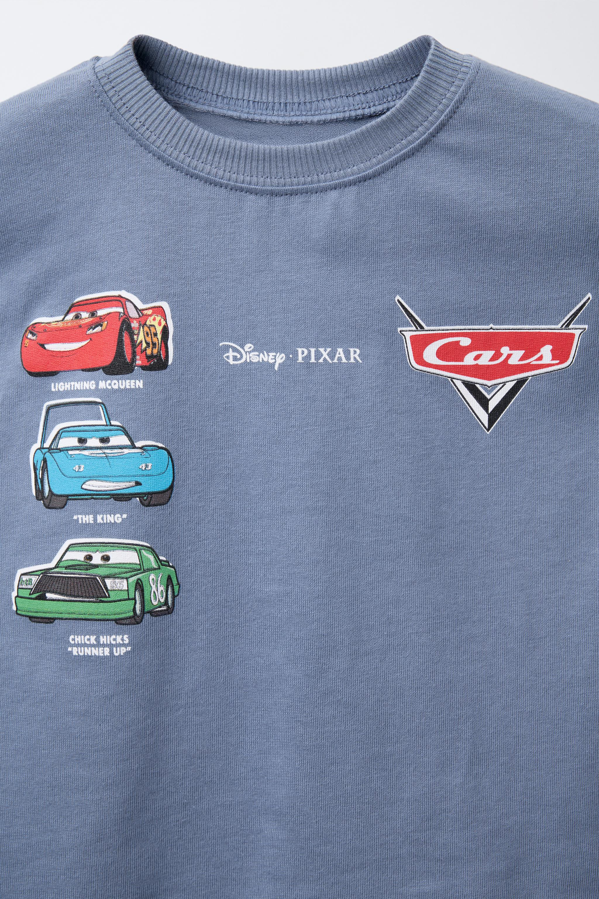 Round neck T-shirt with short sleeves. Cars © Disney print at front and back. | Zara US