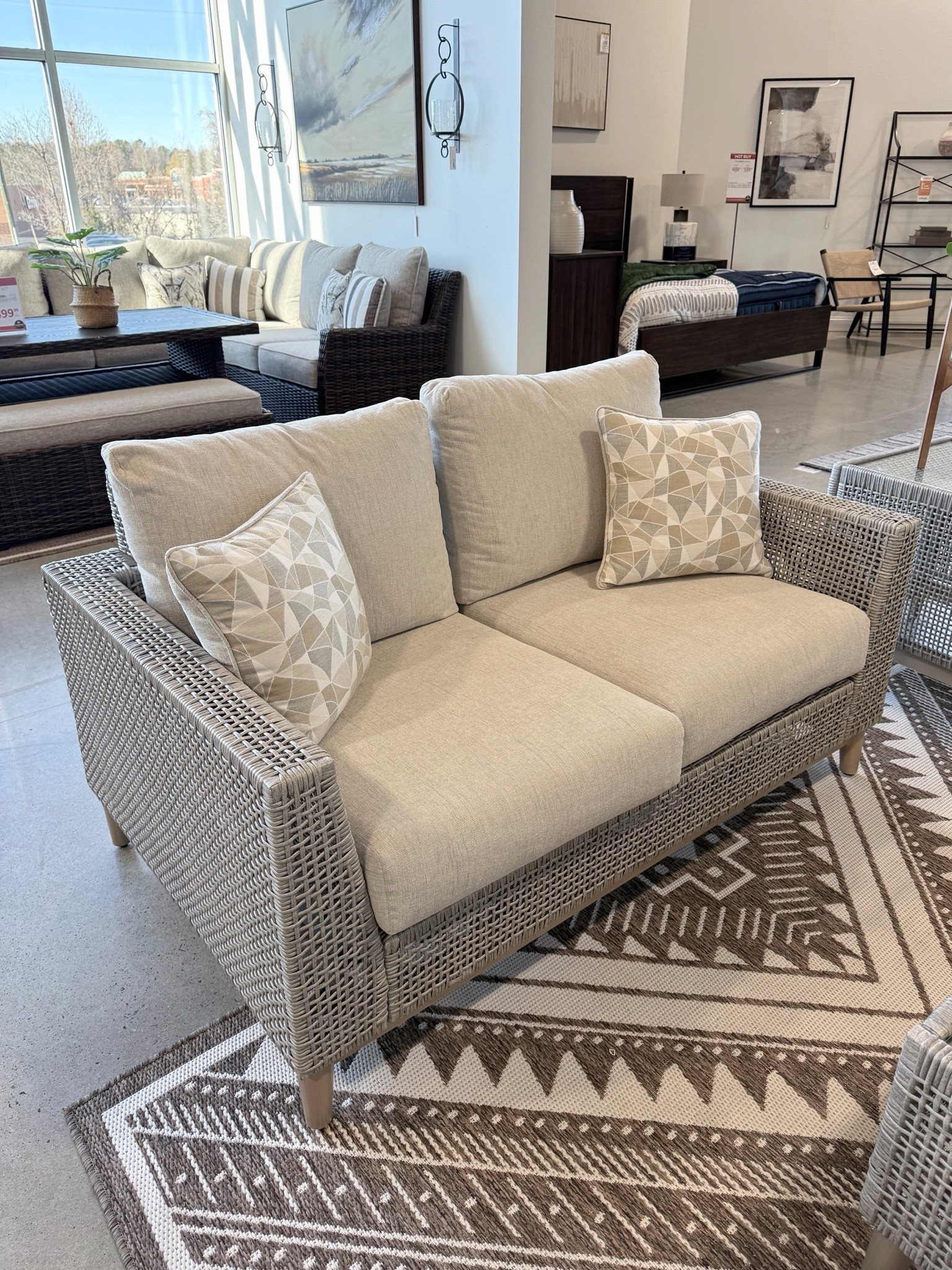 The Seton Creek Outdoor Loveseat from Ashley Furniture has such a beautiful modern outdoor feel with its neutral woven texture, clean lines, and deep cushioned seating. 🩶 The soft gray tones make it easy to style for a warm, layered patio setup that feels elevated yet relaxed. A gorgeous piece for creating an inviting outdoor lounge space this summer. Linked it here! ☀️ #outdoorfurniture #patiofurniture #outdoorlounge

#LTKHome #LTKSaleAlert #LTKSeasonal