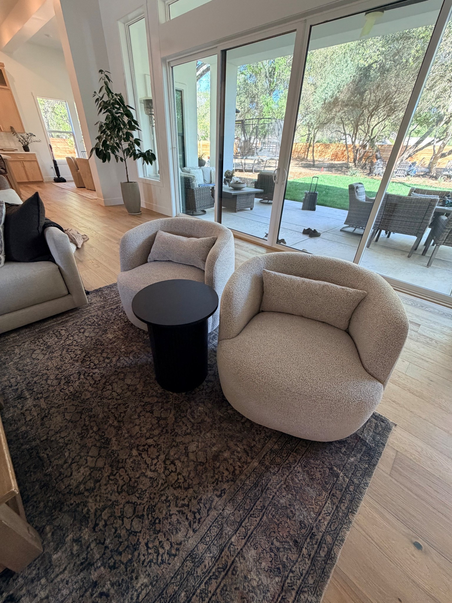 Amazon living room furniture 
Swivel chairs 
Fluted table large area rug 