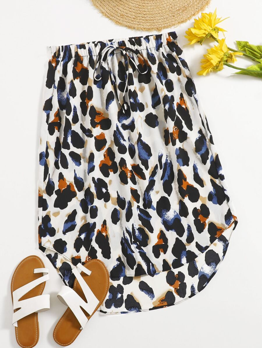 SHEIN Plus All Over Print Knot Front Curved Hem A-line Skirt | SHEIN