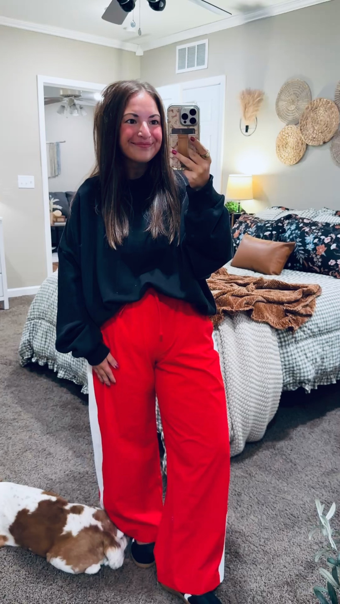 Let the pants do the talking! ❤️ These red wide-leg track pants add a fun pop of color to a black sweatshirt & sneakers. A sporty, casual outfit that would be so cute for game day!

sneakers: fit true to size // wearing a kids 3.5 (linking adult size as well)
pants: fit oversized // wearing a medium
mockneck: fits oversized // wearing a large 

 #LTKootd #LTKMidsize