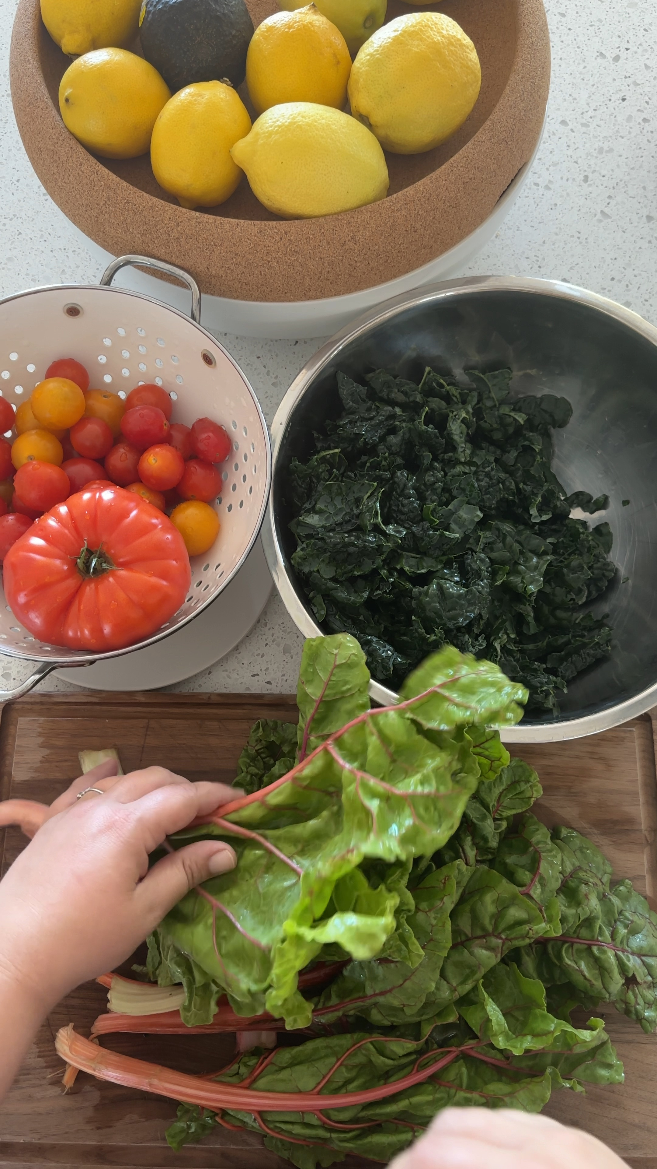 My kitchen workhorses: metal colander, large metal mixing bowl, walnut cutting board, and of course, my big Emile Henry ceramic and cork fruit bowl. #kitchen #essentials 

#LTKhome